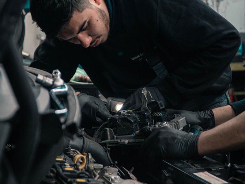 Mobile mechanic doing MOT test